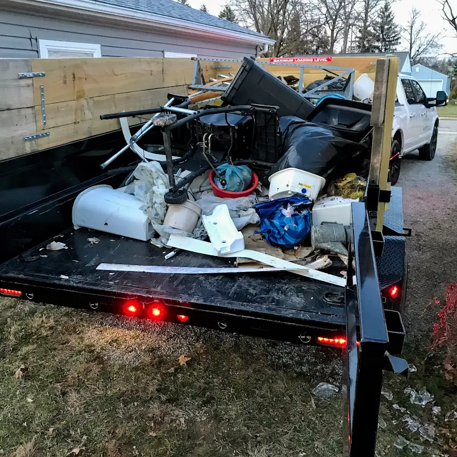 Roll-off dumpster delivered to a residential driveway in Valdese